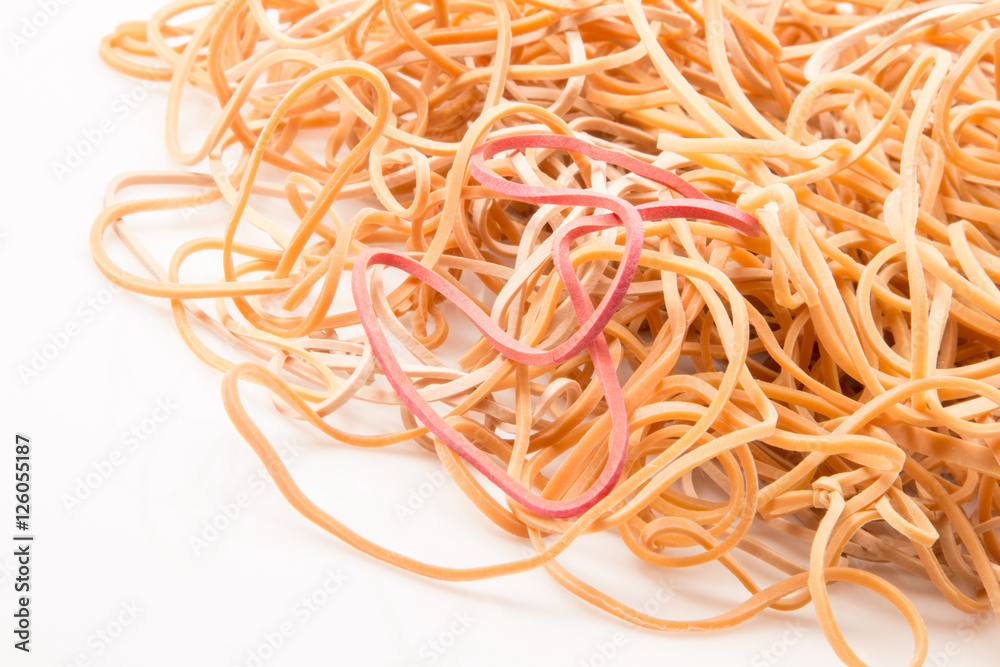 Rubber bands in a pile on a white background.