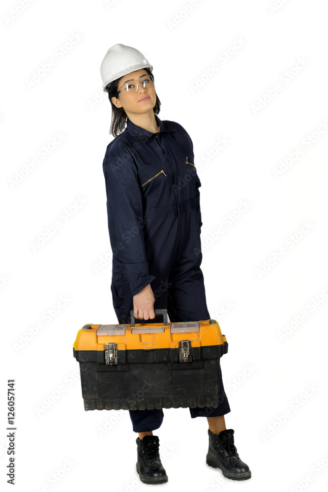 Young girl in blue builder uniform with toolbox isolated on white background Young girl in blue builder uniform with toolbox isolated on white background