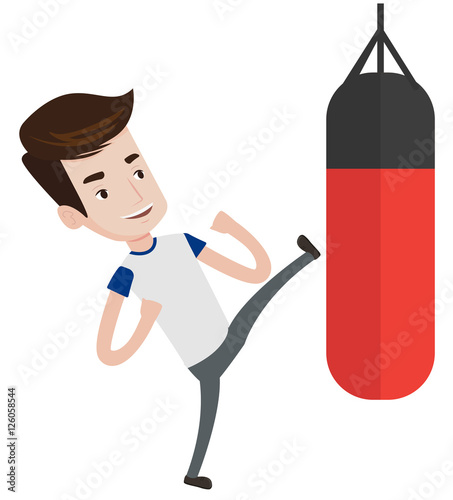 Man exercising with punching bag.