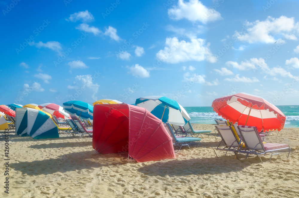 Beach umbrellas at morning Miami beach