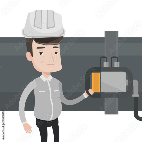 Operator checking detector on gas pipeline.