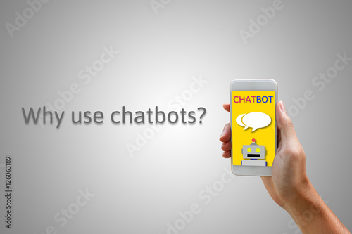Chatbot concept. Man holding smartphone and using chatting.