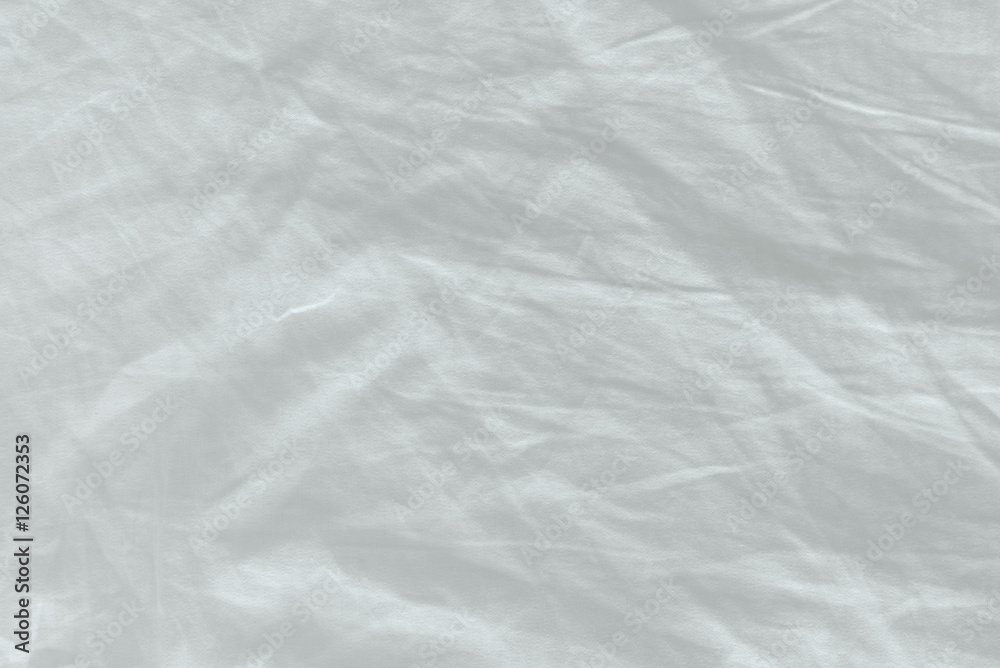 Unmade bed sheet texture