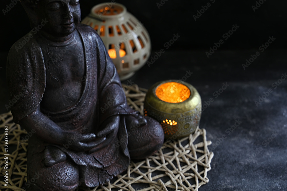 Fototapeta premium buddah witn candle spa concept
