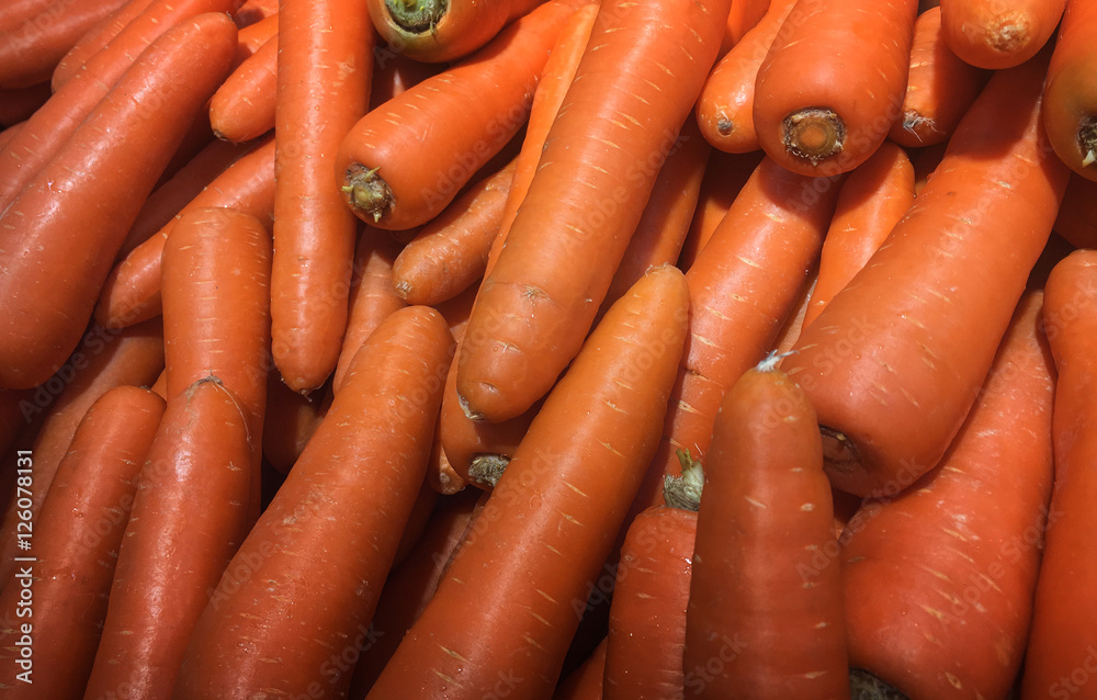 close up a group of Organic carrot. Food background.fresh carrot at the market store close up a group of Organic carrot. Food background.fresh carrot at the market store