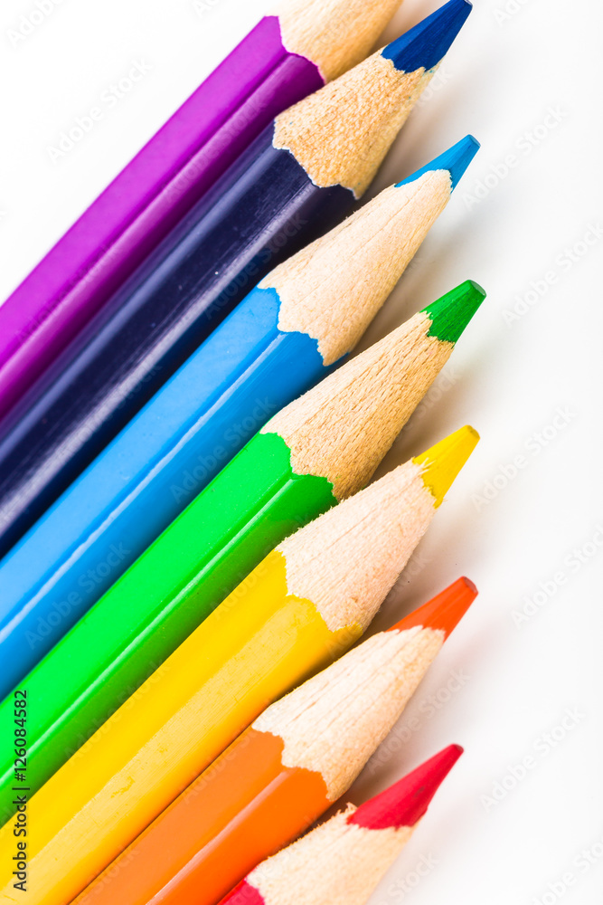 Many different colored pencils on white background Many different colored pencils on white background