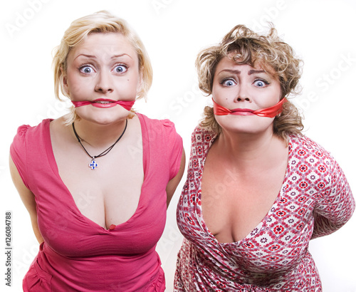 two adult fat women hostages tied up with the mouth