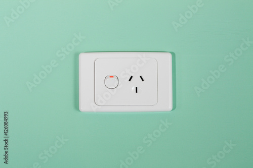 Australian electricity wall socket illustrating expensive power, green energy and bill shock.