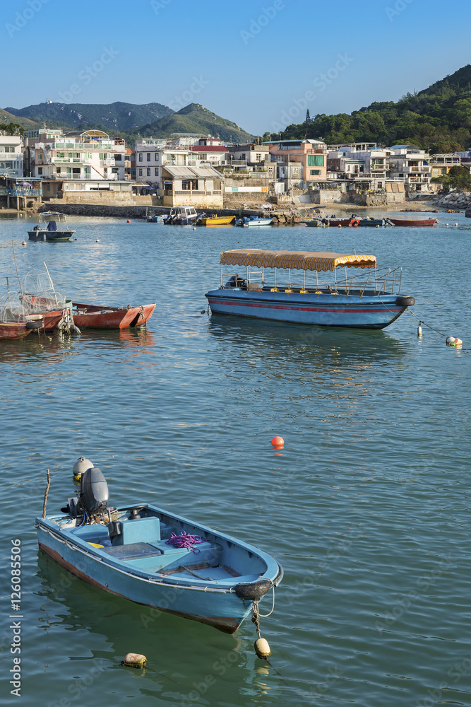 Idyllic landscape of fishing village Sok Kwu Wan on Lamma Island, Hong Kong
