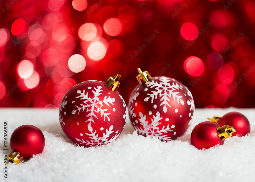 Christmas Baubles on red background with sparkles . Christmas Baubles on red background with sparkles .