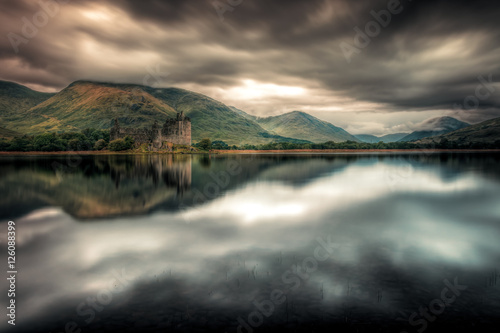 Landscape of Scotland during stormy weather: Kilchurn Castle in the dark. Loch Awe in Argyll and Bute - Highlands