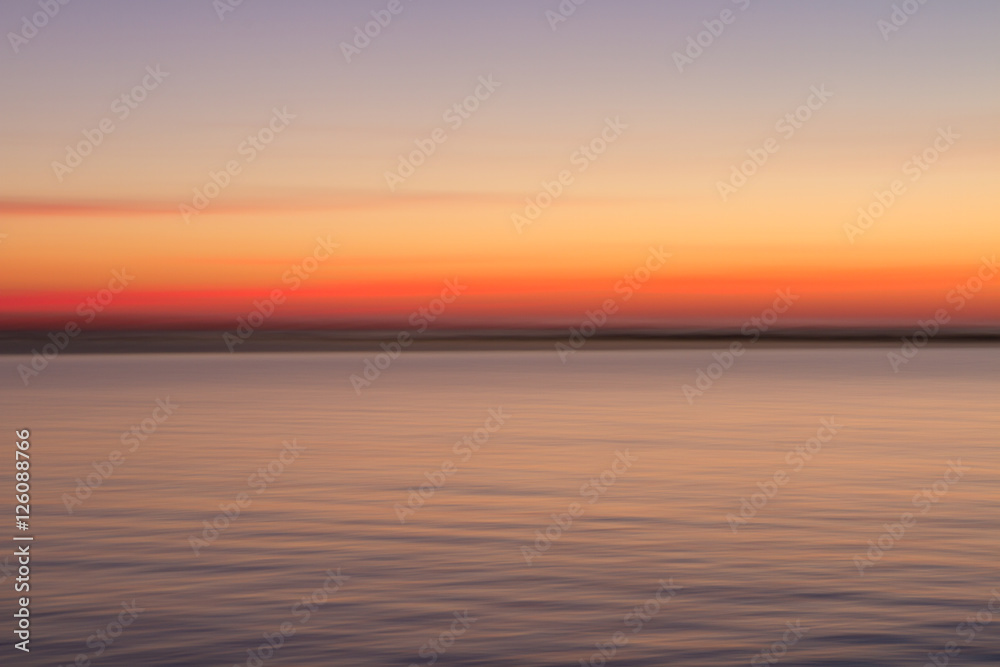 Blurred sunset, sky and sea