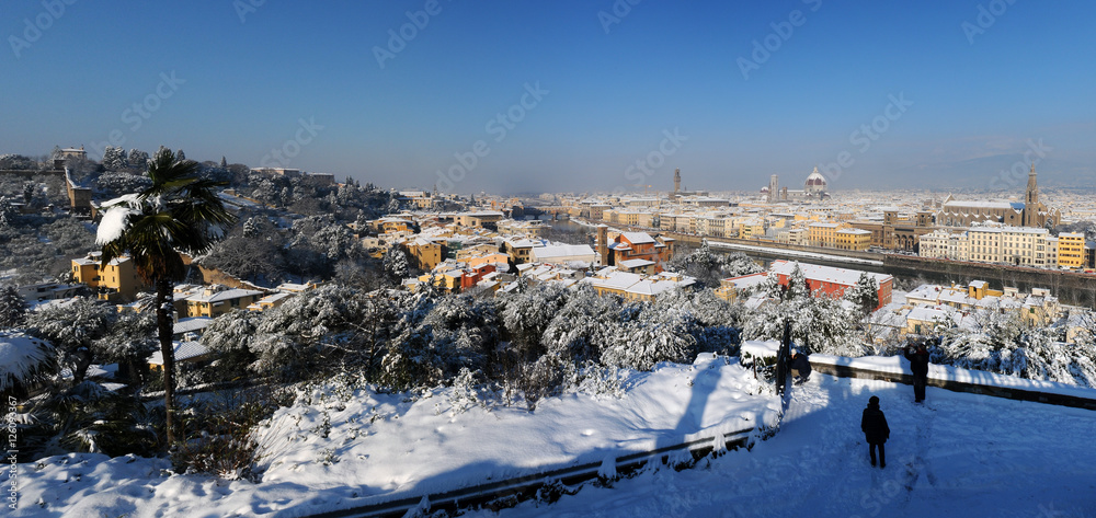 Ponte Vecchio or Old Bridge in Florence with snow panorama from Piazzale Michelangelo, Tuscany, Italy