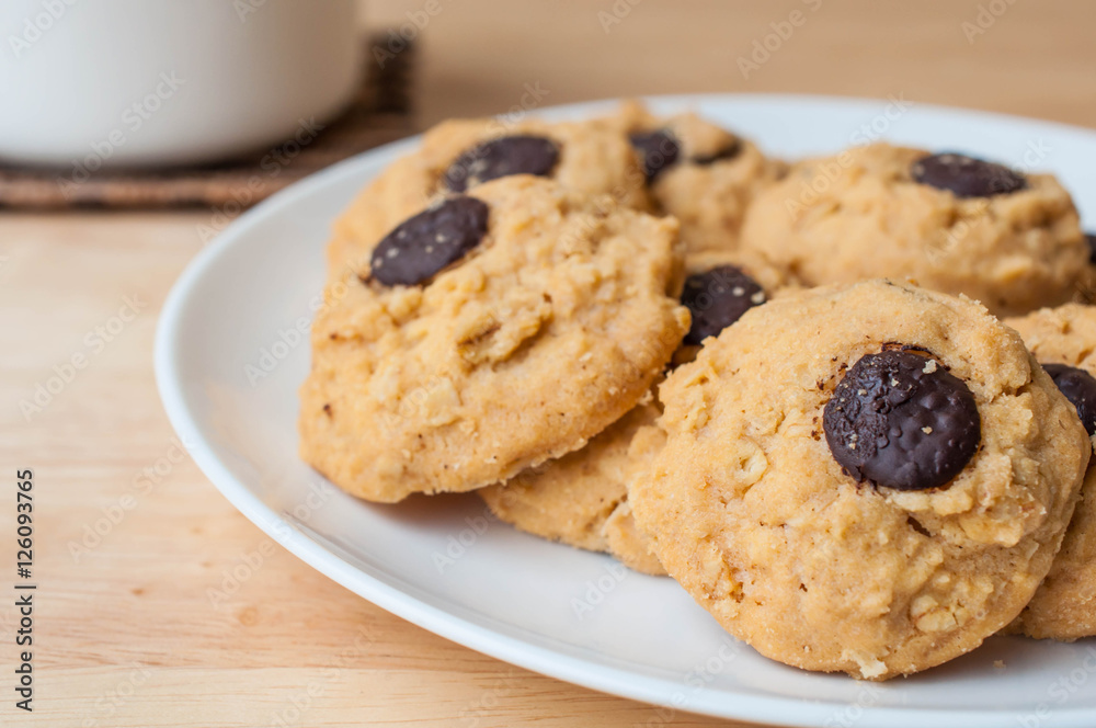 Butter Cookie and milk on wooden table