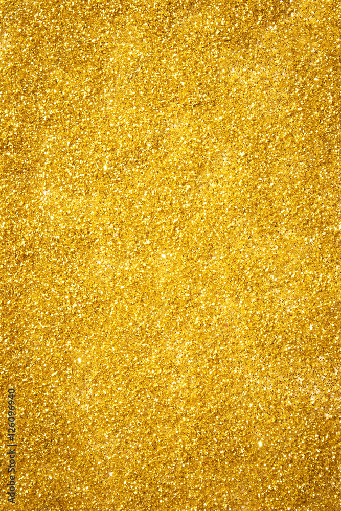Beautiful abstract background with golden glitter, vertical photography Beautiful abstract background with golden glitter, vertical photography