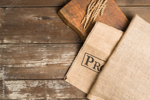 cutting Board and bags on a wooden table