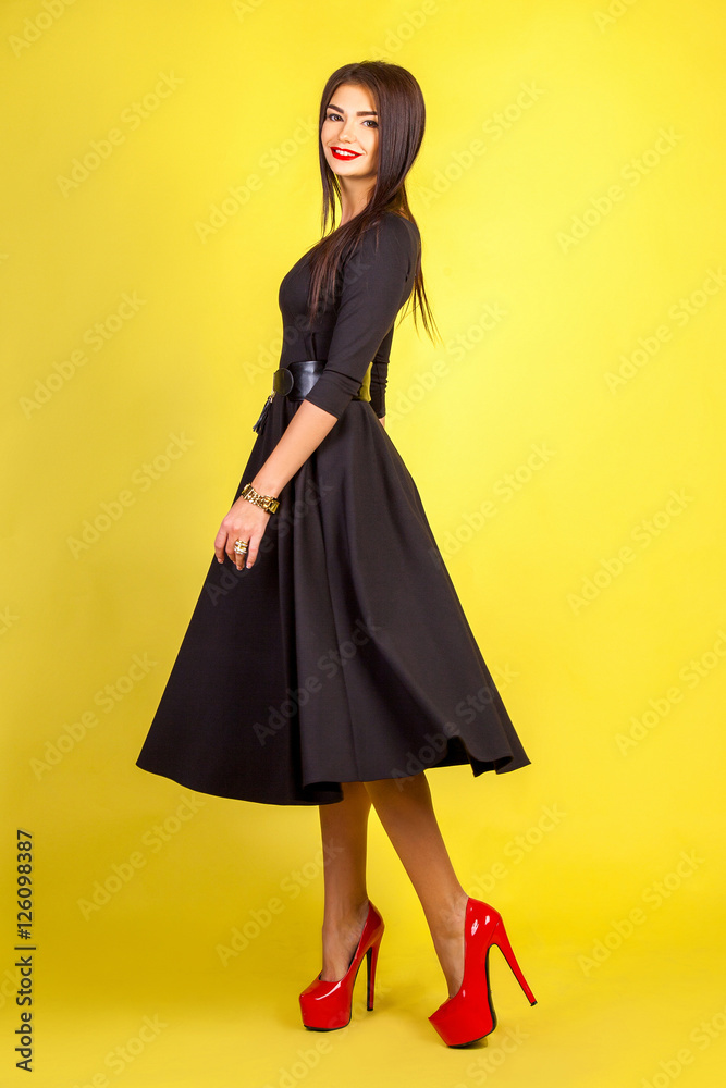 Fototapeta premium girl on a yellow background