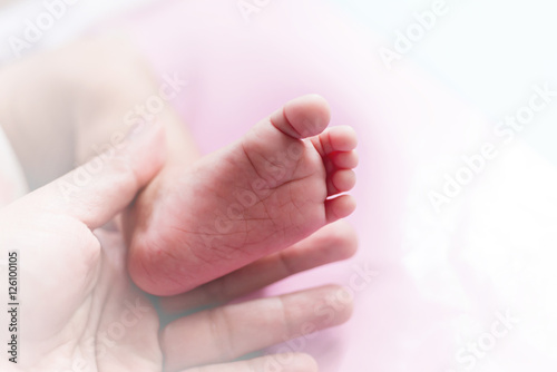 Soft Focus of Soft Focus of Newborn Baby Foot High Key Background © Platoo Studio