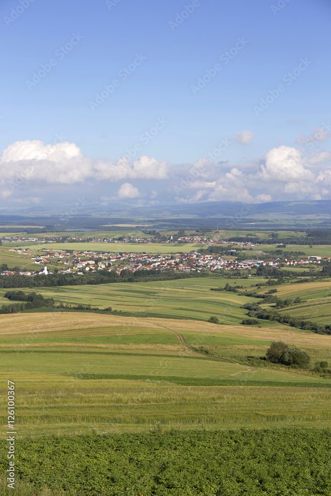 Fototapeta premium Clear green Landscape with little Village from the summer Mountains Magura in Slovakia