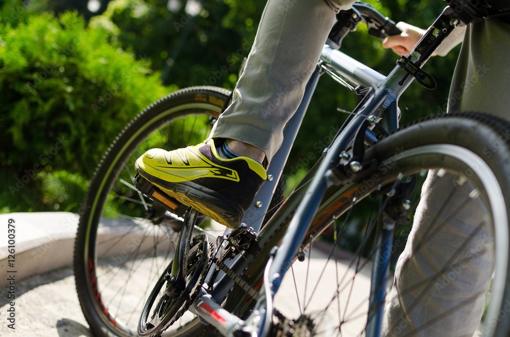 Naklejka premium Young man with bicycle