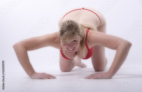 Woman exercising - November 2016 - Keeping fit a middle aged woman doing push ups photo