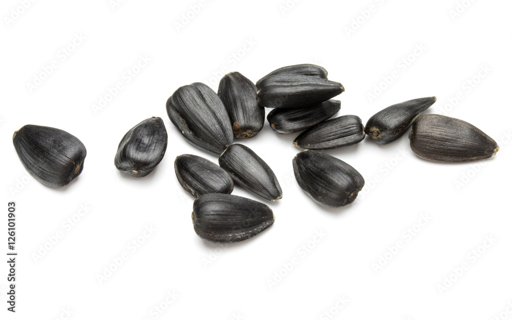 Sunflower seeds isolated on white background close up Sunflower seeds isolated on white background close up