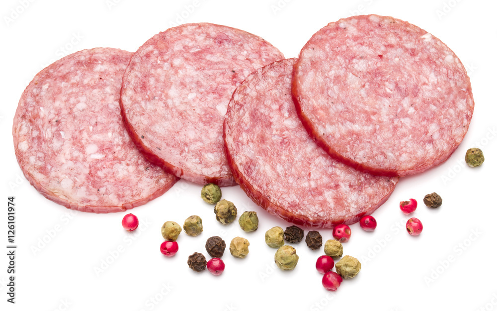 Salami smoked sausage slices and peppercorns isolated on white b Salami smoked sausage slices and peppercorns isolated on white b