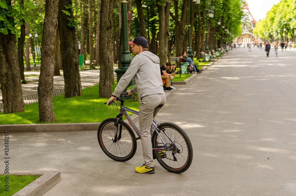 Young man with bicycle Young man with bicycle