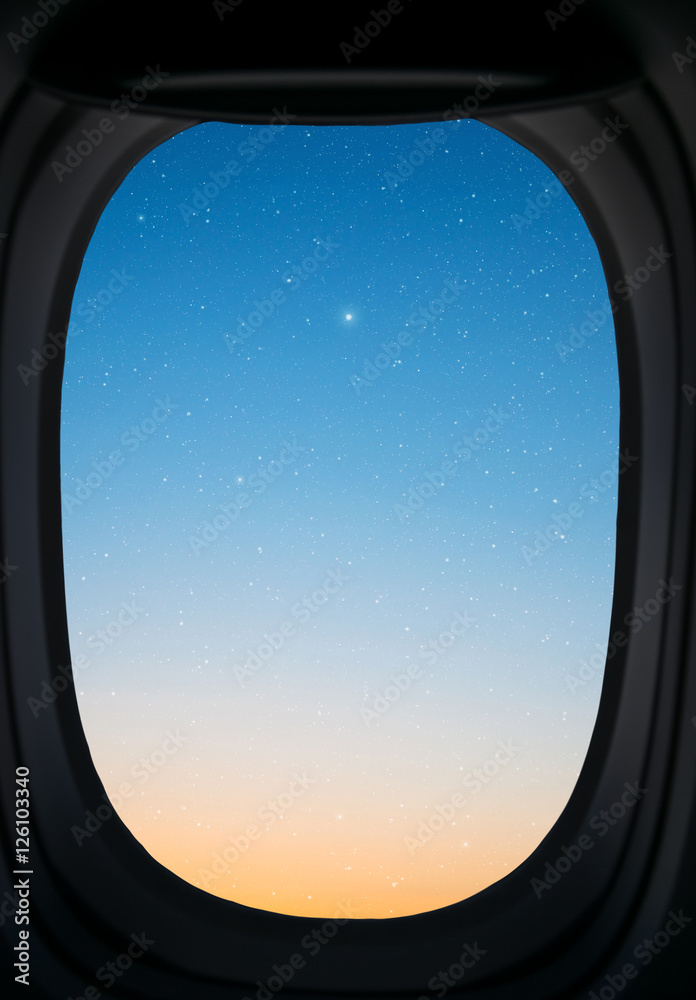Window view of sunset sky and stars. Window view of sunset sky and stars.