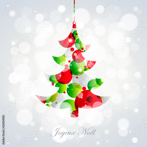 Sapin de Noël rouge et vert sur bokeh