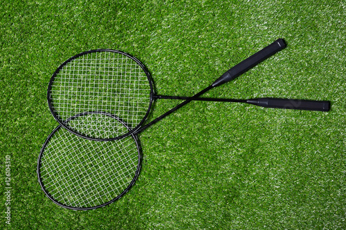  badminton racket on grass