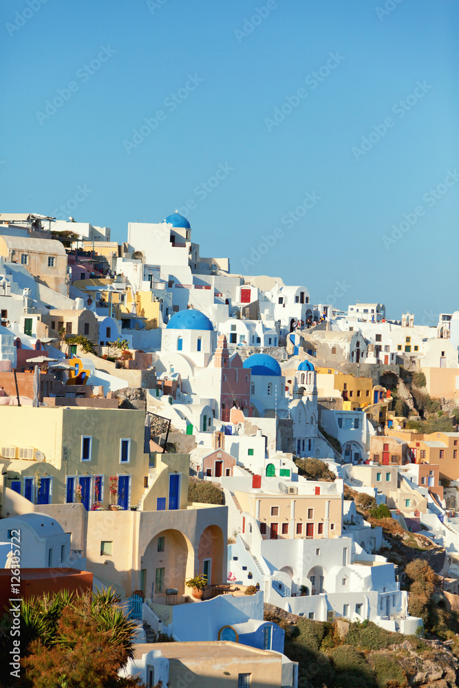 Hotels and villas with sea view in Oia, Santorini, Greece. Shot