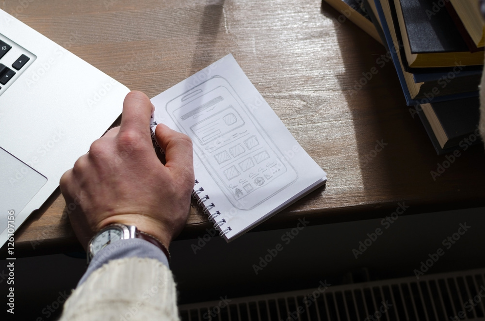 Naklejka premium A notebook with a drawing table in it