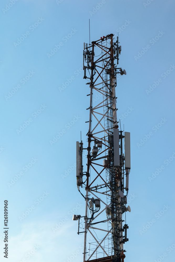 wireless comunication tower with antenna on clear sky wireless comunication tower with antenna on clear sky