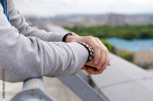 Young man is resting on the roof