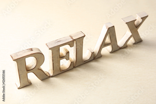 Wallpaper Mural Wooden word RELAX on light background Torontodigital.ca