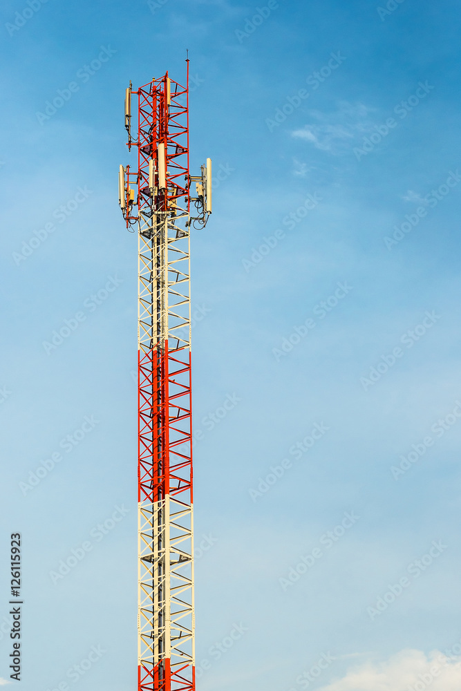 Red and white tower of communications Red and white tower of communications