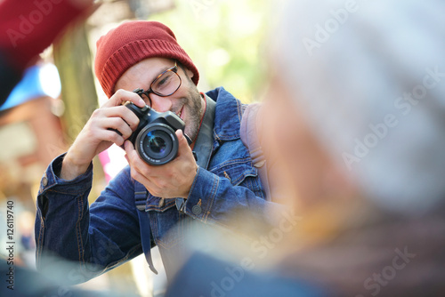 Photographer taking picture of girl in NYC streets