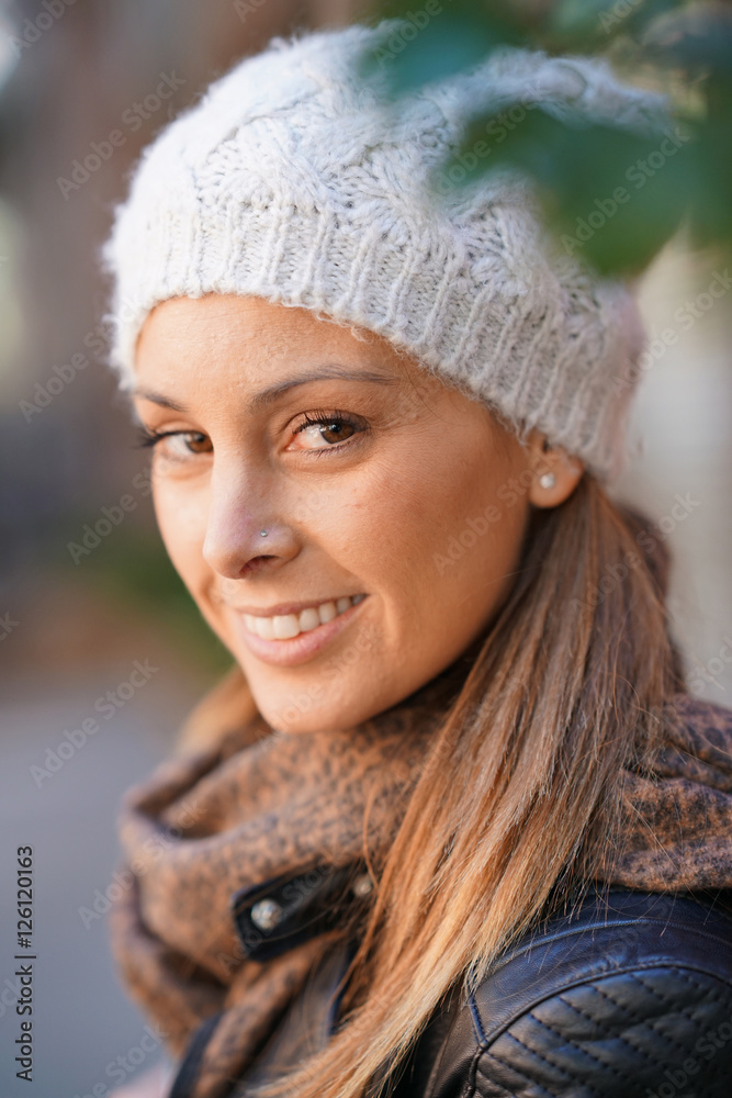 Young woman with trendy style standing in the street Young woman with trendy style standing in the street
