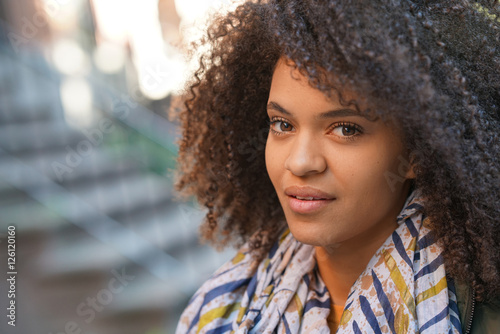 Portrait of beautiful mixed-race girl © goodluz