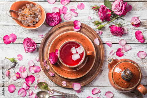 Rose buds tea in a cup photo