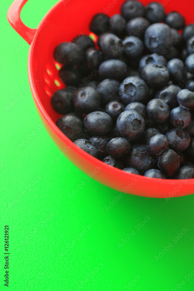 Fresh blueberries with green background Fresh blueberries with green background