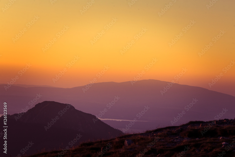 A beautiful view of the sunset in mountains