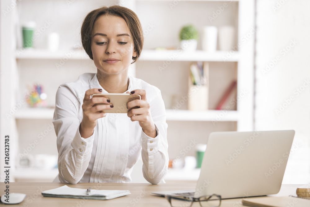 Woman using mobile phone