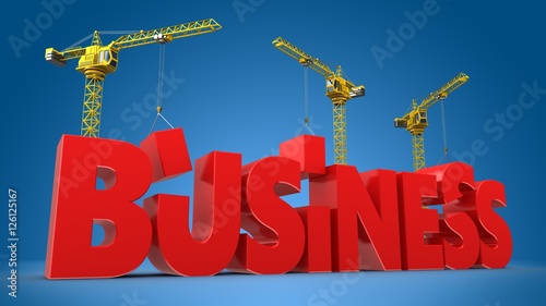 3d illustration of cranes building  word over blue background photo