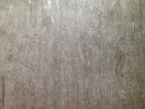 Texture of Raw grey exposed concrete wall.