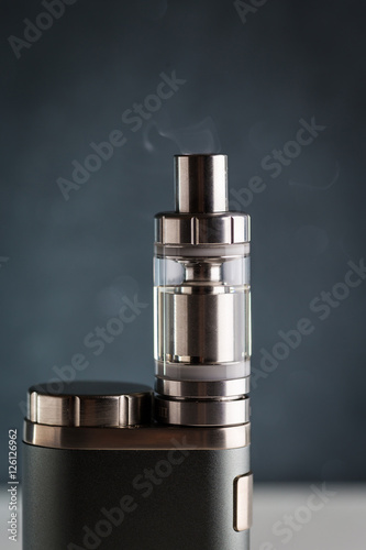 electronic cigarette, vape with a smoke on a black background