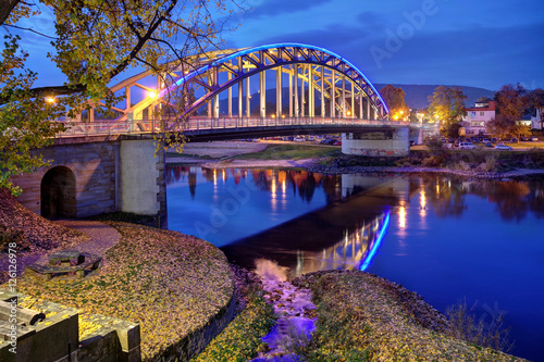 Beleuchtete Weserbruecke bei Rinteln im Weserbergland photo