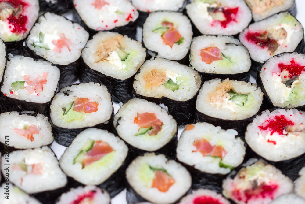 Fresh and delicious sushi and rolls of rice. Fresh and delicious sushi and rolls of rice.