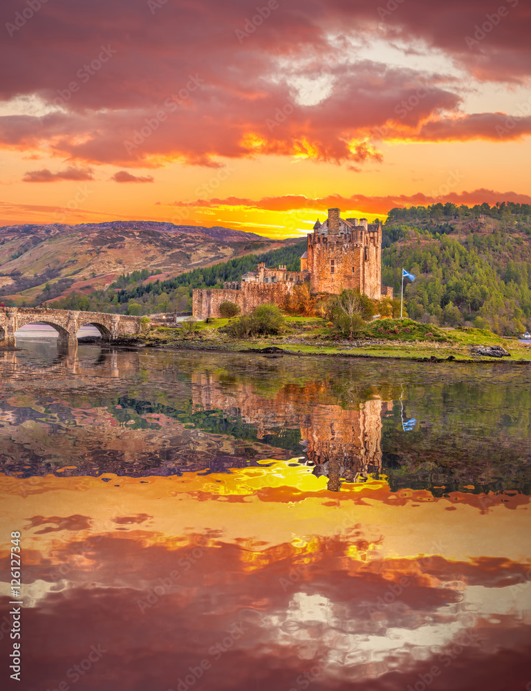 Eilean Donan Castle against sunset in Highlands of Scotland